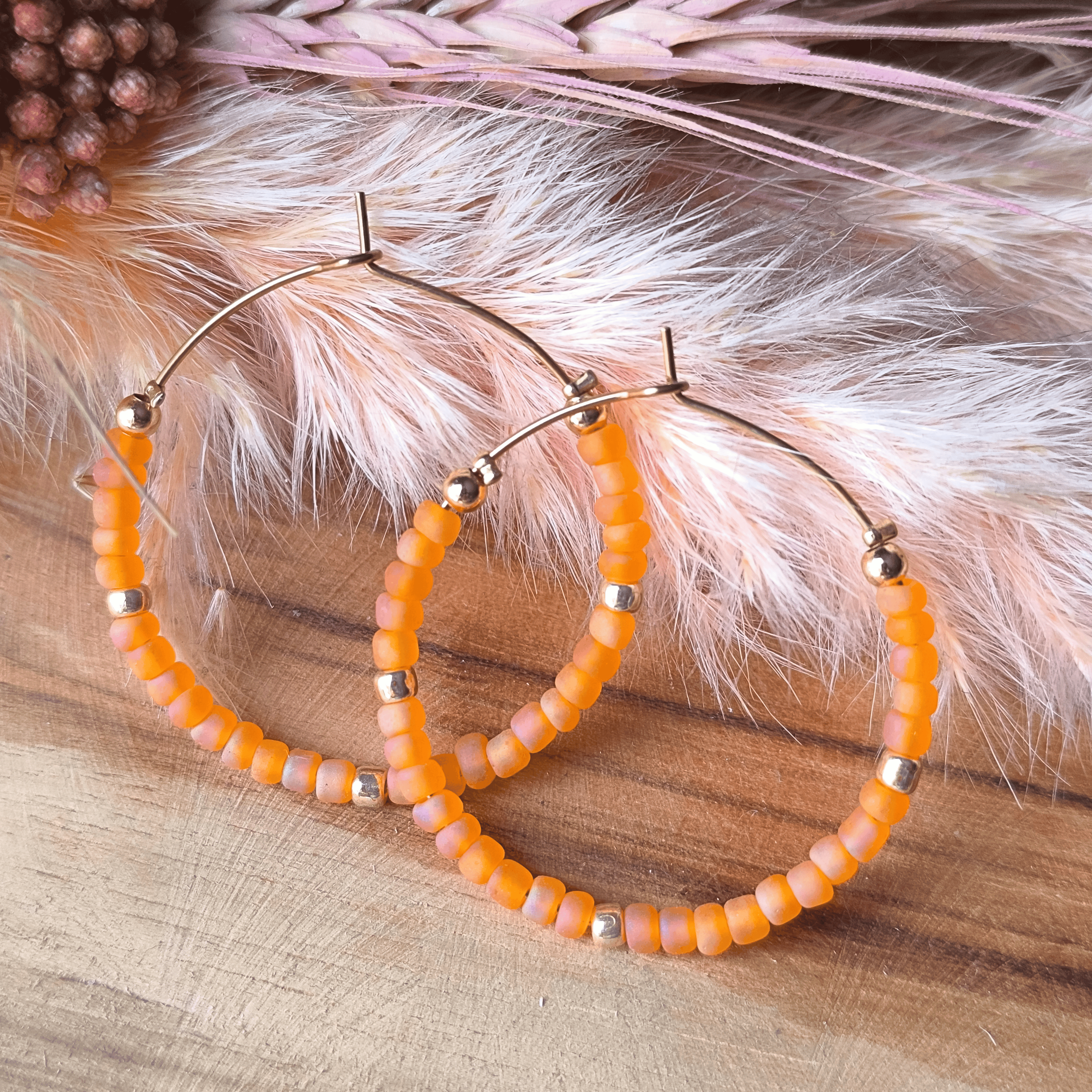 Créoles acier inoxydable perles orangées