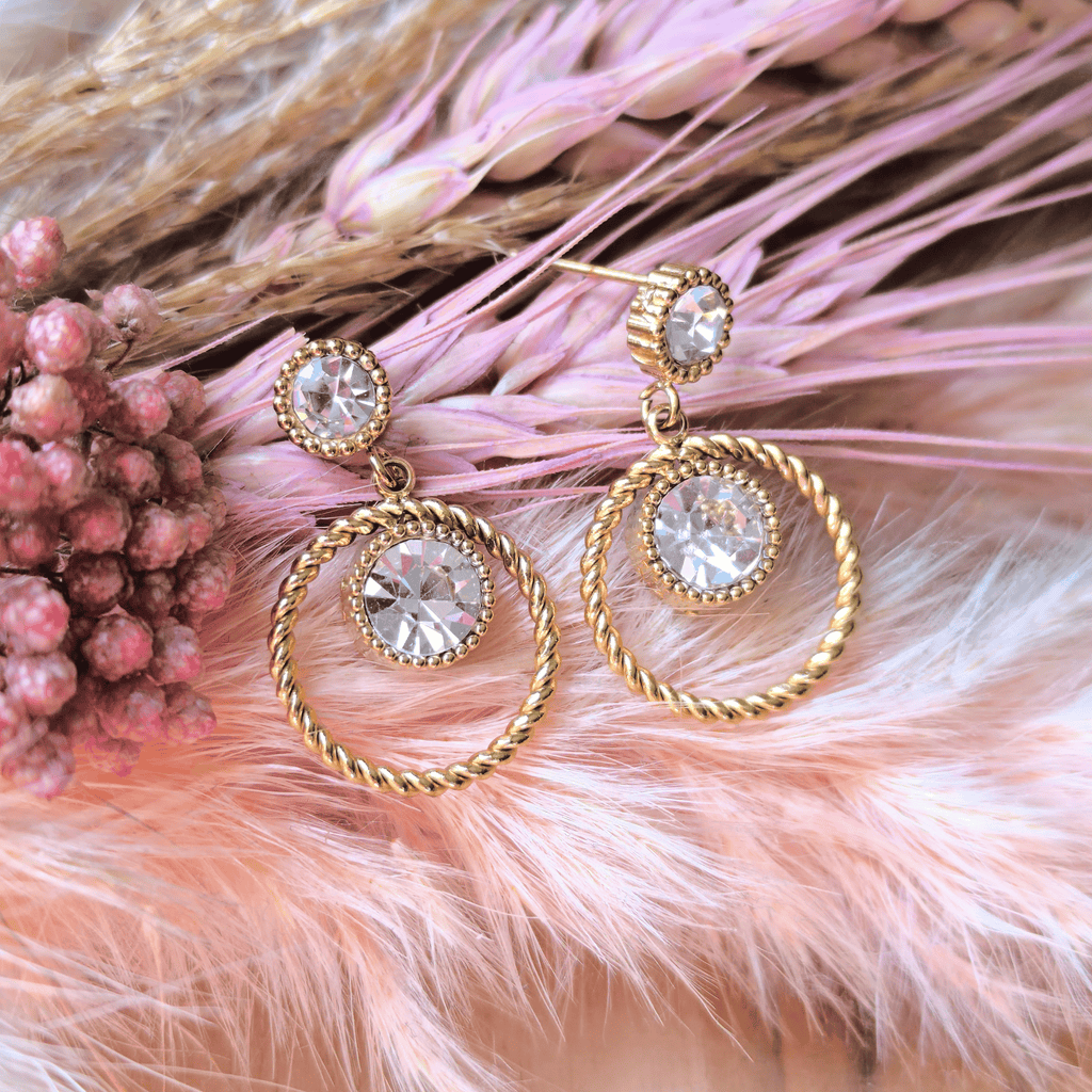 Boucles d’oreilles strass blanc ou violet