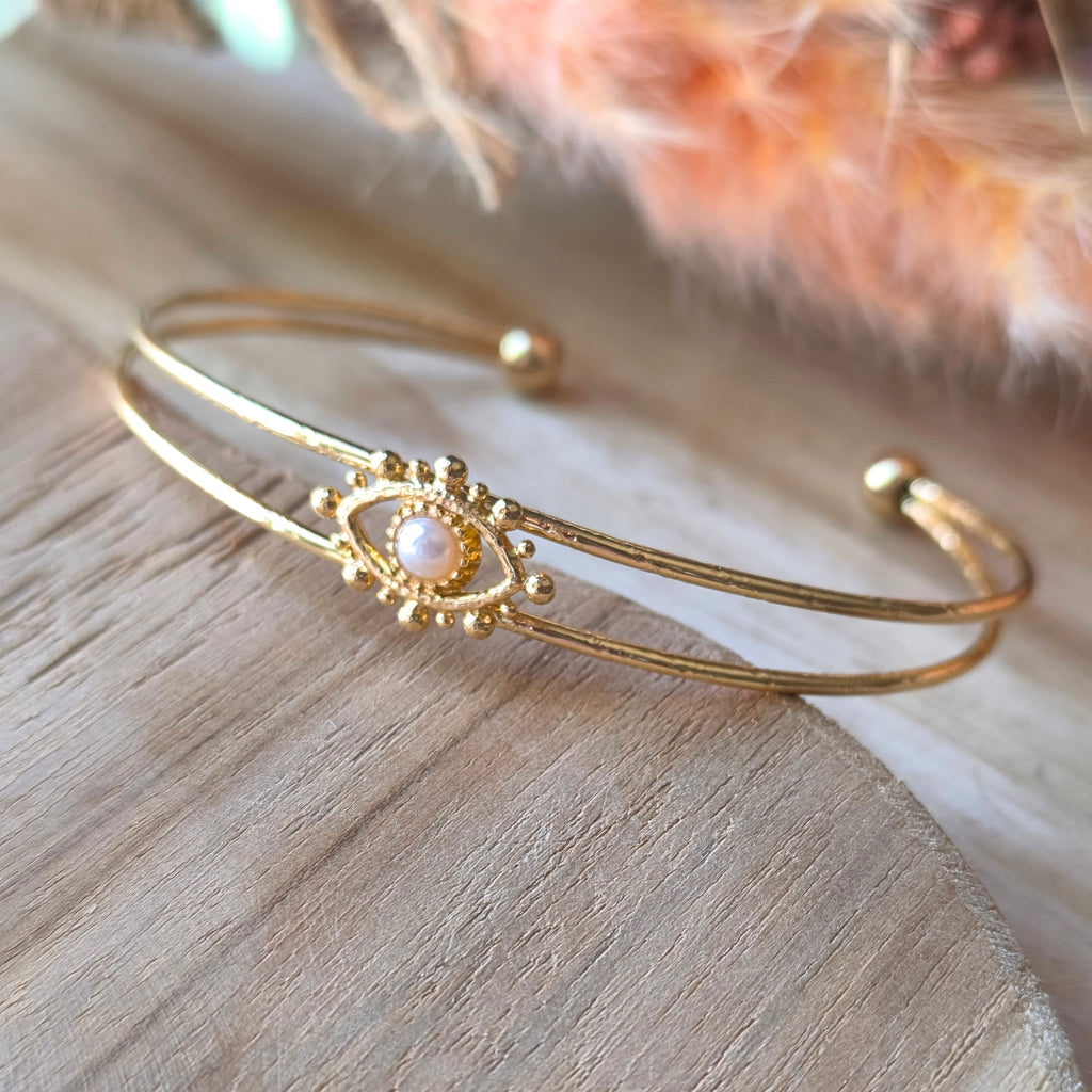 Bracelet jonc double œil protecteur et perle nacrée