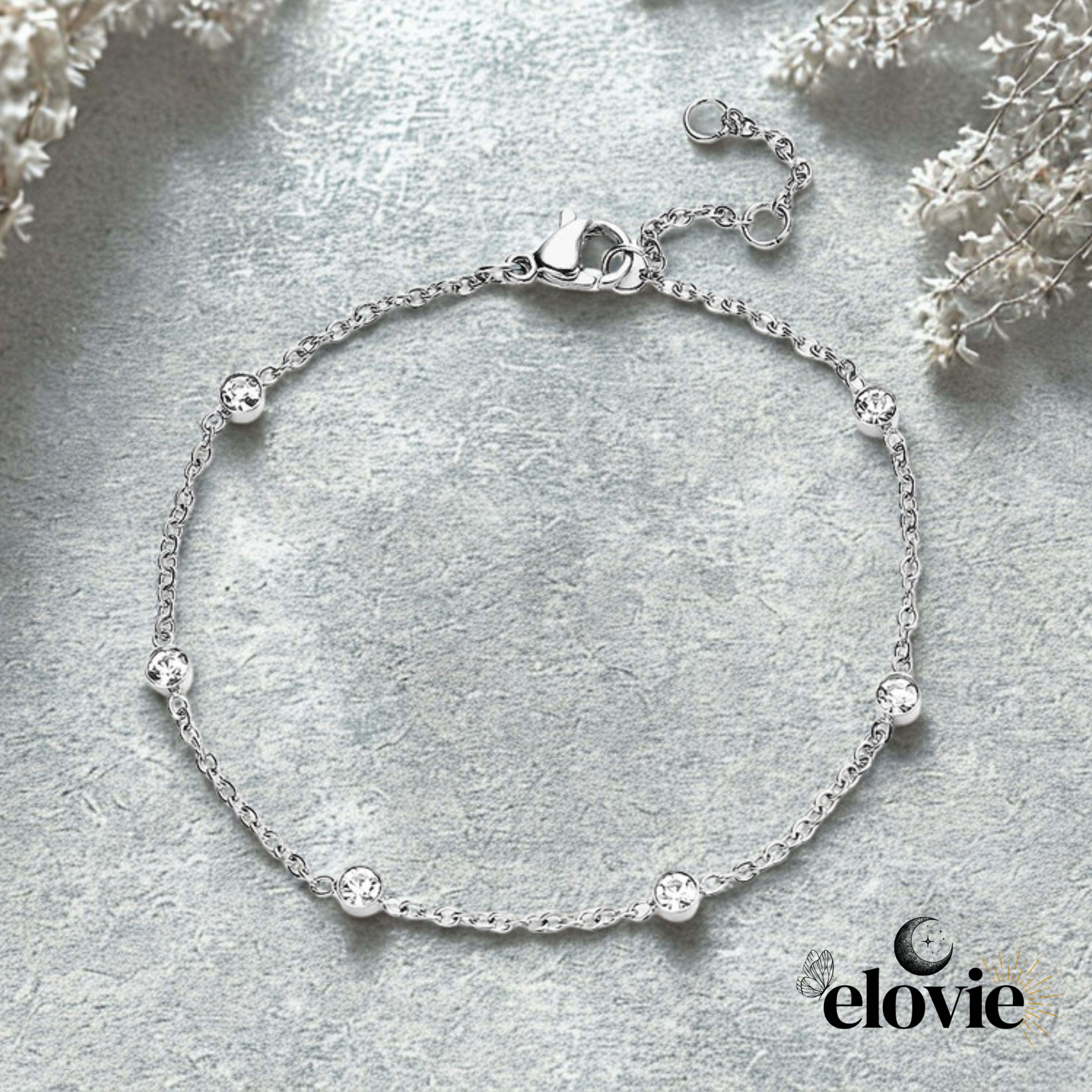 Bracelet argenté ou doré en acier inoxydable – Orné de strass scintillants