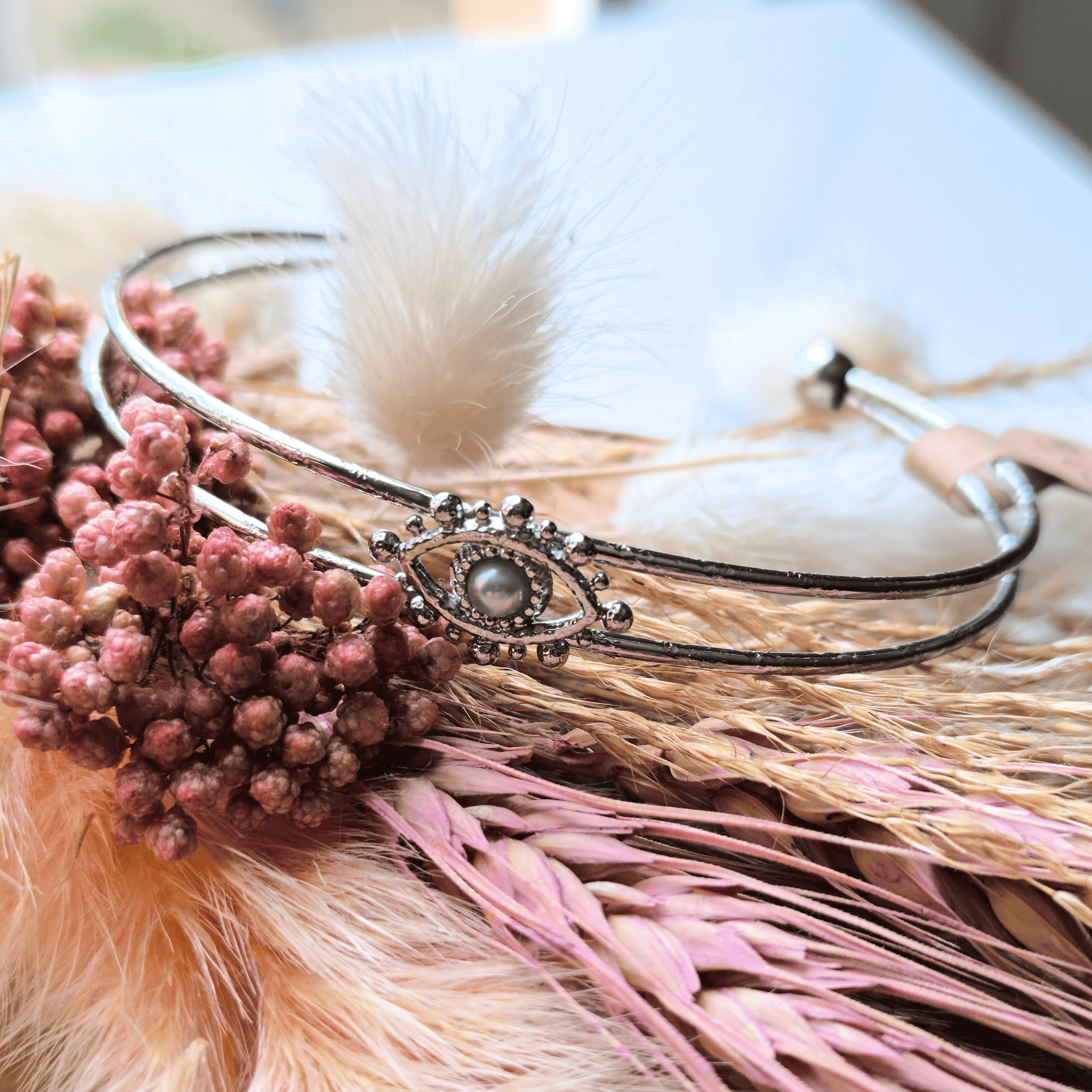 Bracelet jonc double œil protecteur et perle nacrée