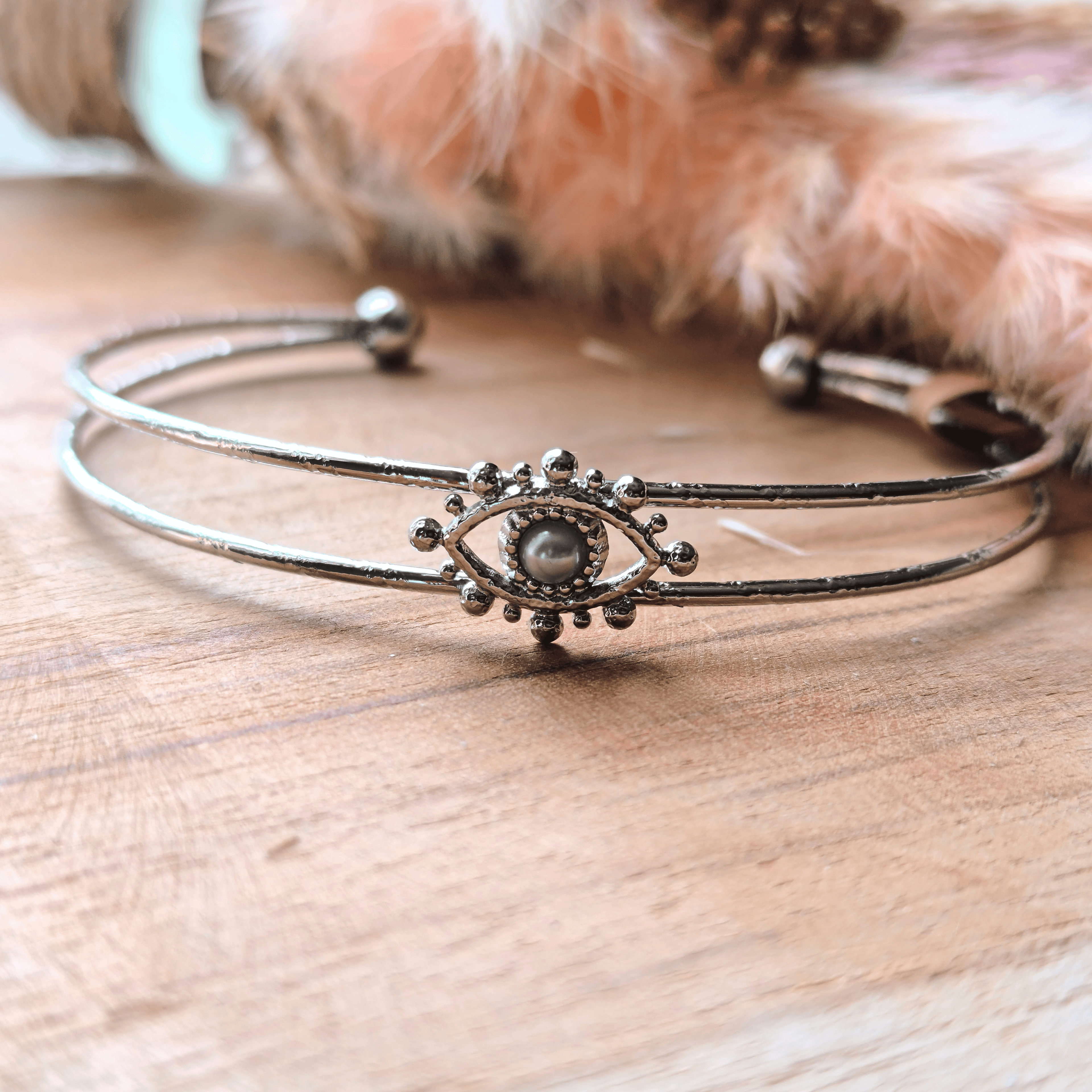 Bracelet jonc double œil protecteur et perle nacrée